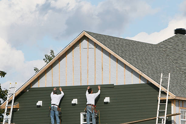 Professional Siding Contractor technician working in Bowie, TX